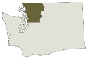 Outline of the state of Washington in light green with shaded area representing the Cascade Mountains area in dark green