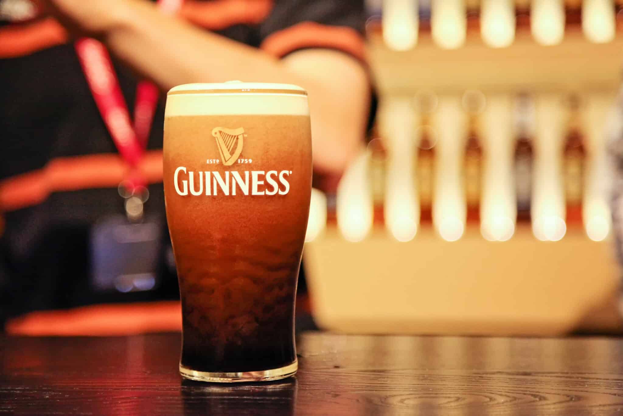 Close-up shot of a pint class of Guinness beer