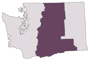 Outline of the state of Washington in light purple with shaded area representing the Wine Country area in dark purple